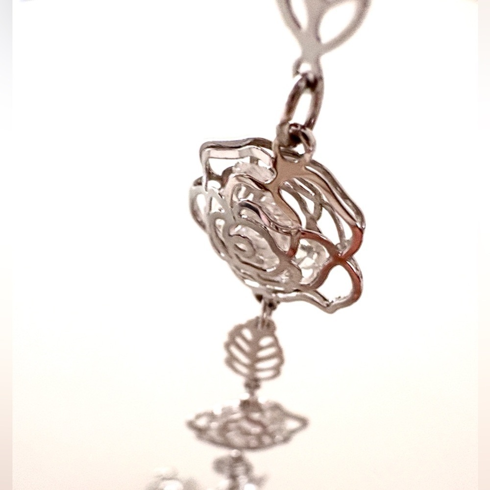 New! Elegant Silver Hollow Rose Bracelet With Clear Crystals Inside - Picture 3 of 4